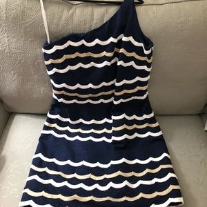 Lilly one shoulder dress with scalloped hem.